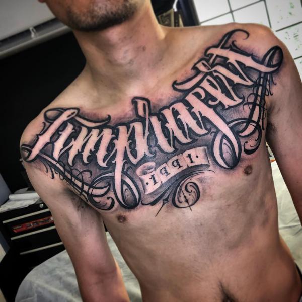 LIMPRASERT Nagy stílusú betűs tetoválás