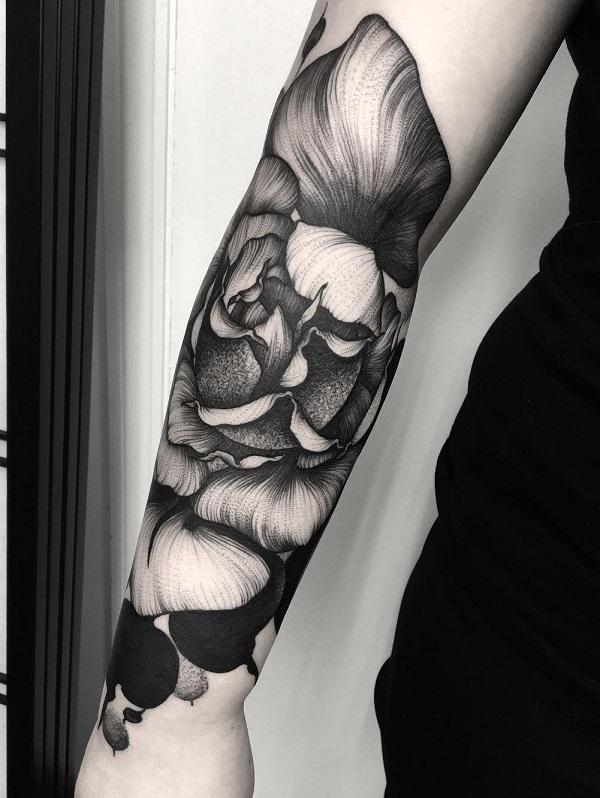 Blomst tatovering på underarmen