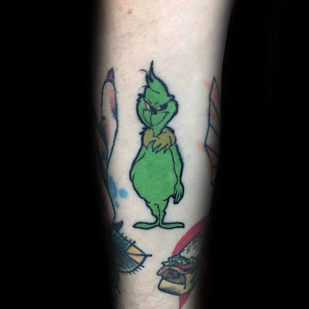 grinch-mens-tattoo-ideas-on-underarm