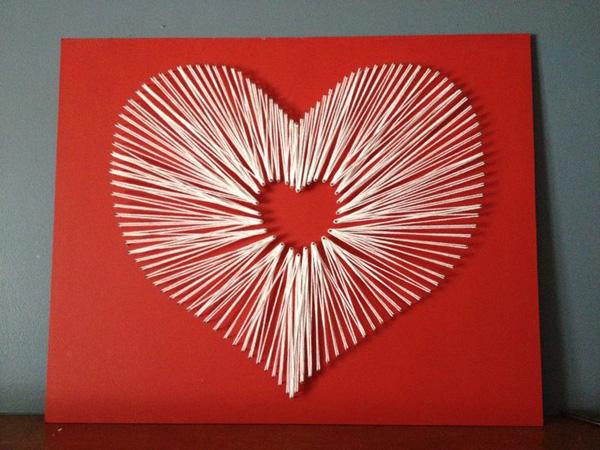 Kunstneriske hjerteformede symboler DIY ved bruk av papir