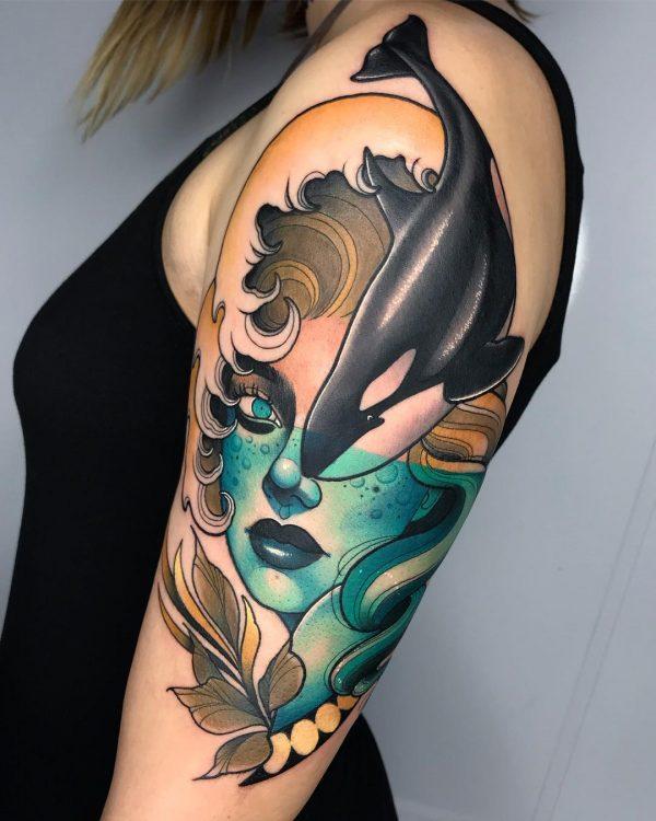 Óceáni delfin ujjú tetoválás