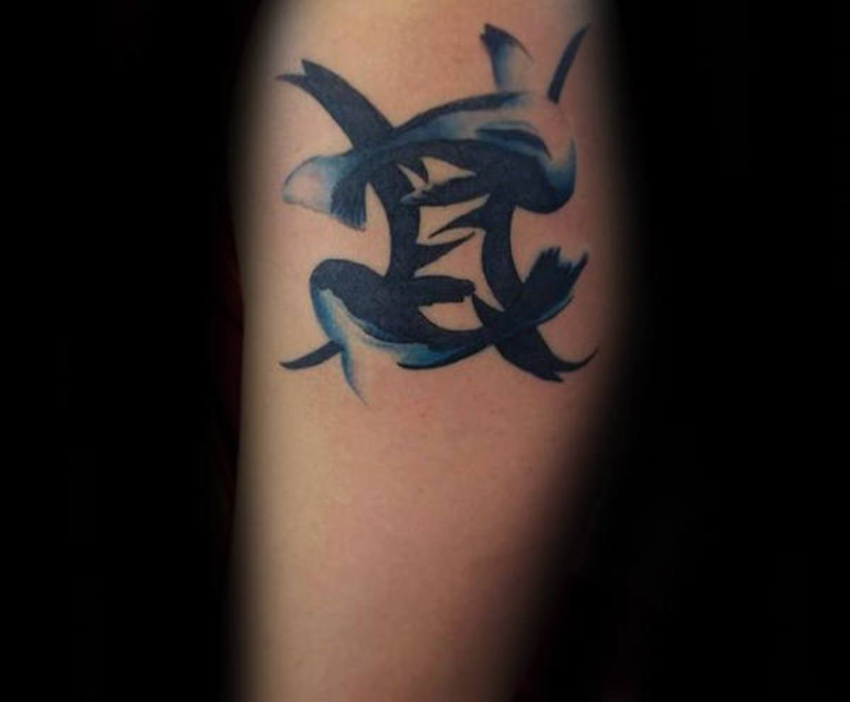 kreatív-halak-férfi-kar-tetoválás-inspiráció