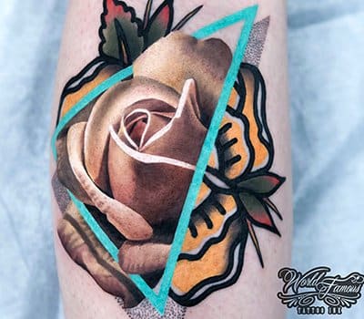 Chris Rigoni fotója Annyira elgondolkodtató, hogy megérdemelte az 1. helyet a vegyes stílusú tetoválások listáján. Ennek hasonló színű témája keveredik a realizmussal és a hagyományos.
