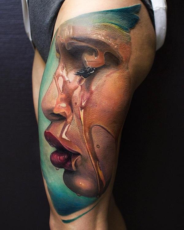 Realistisk farget smerte som tatovering