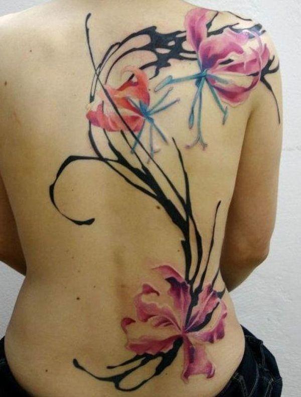 Elegant magnolia akvarell tatovering på full rygg for kvinne