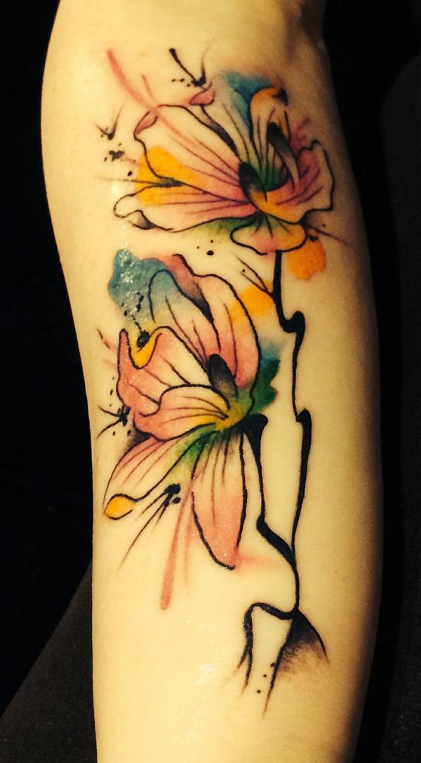 Akvarell magnolia tatovering
