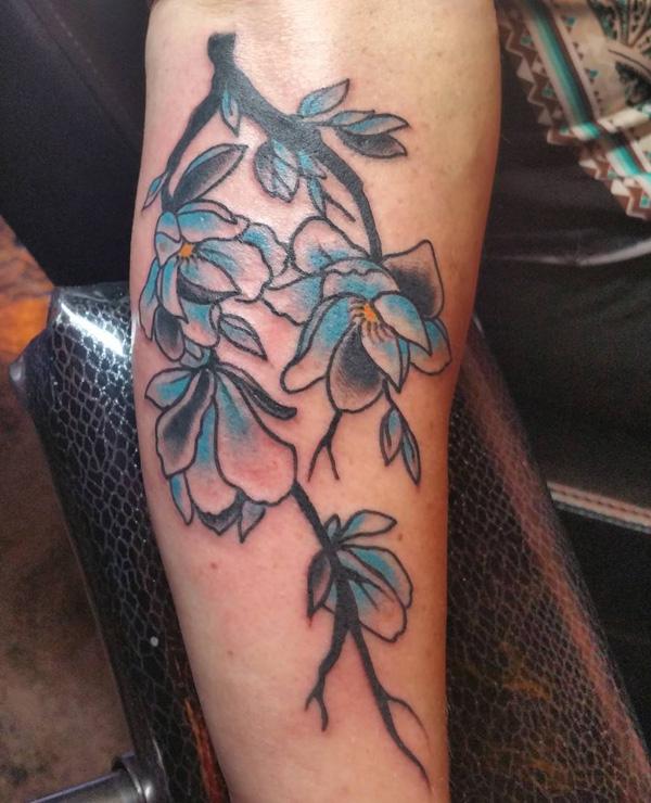 Magnolia tatovering på etterslep