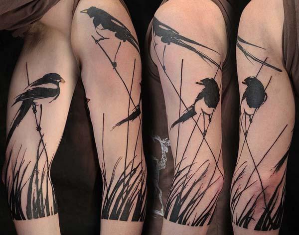 Silhouette fugler tatovering med full erme