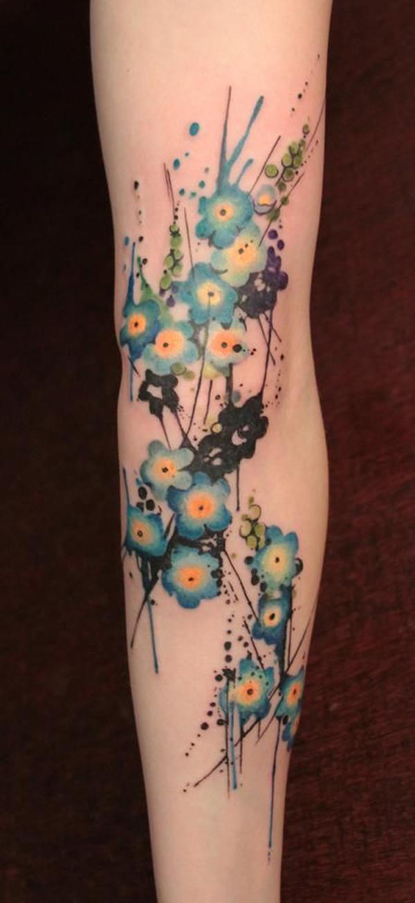 Akvarell tusenfryd blomster tatovering