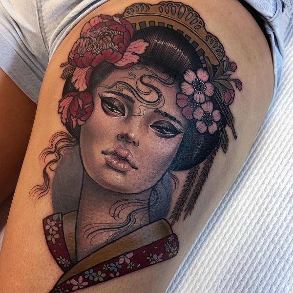 Gésa portré tetoválás a combon