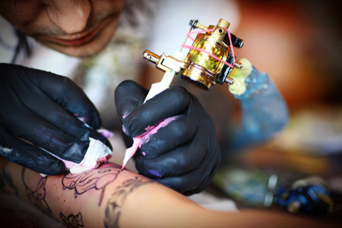 Mann-tatovering-arm-612606