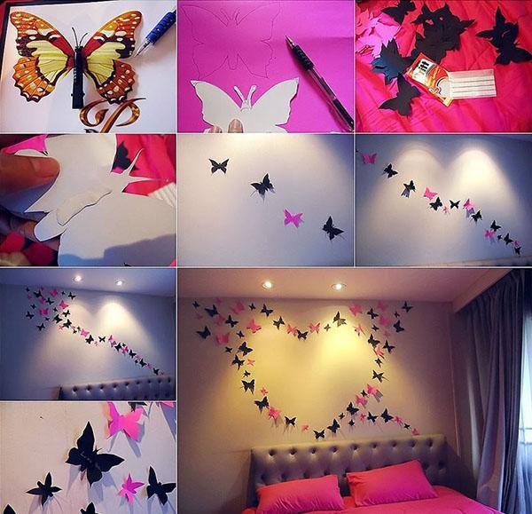 papieren vlinders aan de muur