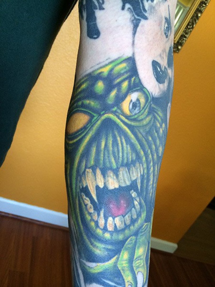 Eddie coverup tattoo av Corey Reed.