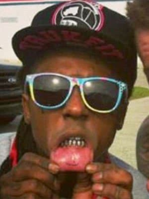 Fotó: Instagram. És természetesen mindannyian emlékezünk Lil Wayne bizarr mosolygós arc tetoválására.